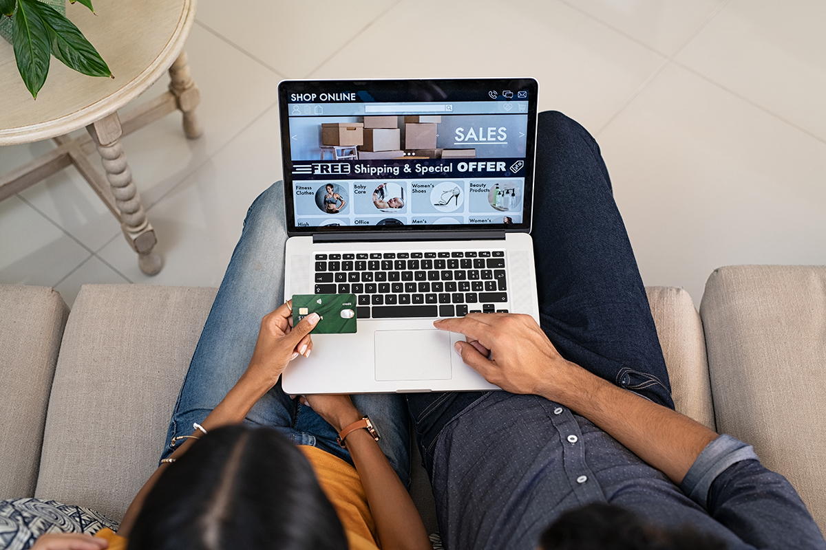 Couple doing shopping online with credit card